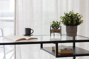 Studio Near Manufaktura Łódź by Renters