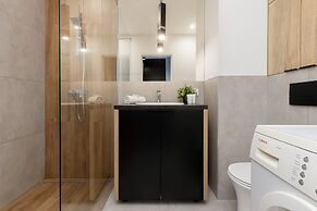 Studio Near Manufaktura Łódź by Renters