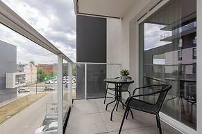 Studio Near Manufaktura Łódź by Renters