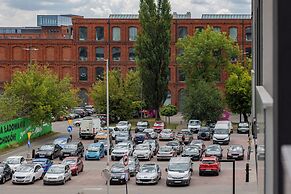 Studio Near Manufaktura Łódź by Renters