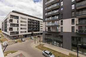 Studio Near Manufaktura Łódź by Renters