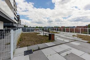 Studio Near Manufaktura Łódź by Renters