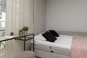 Studio Near Manufaktura Łódź by Renters