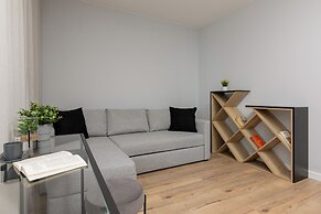 Studio Near Manufaktura Łódź by Renters