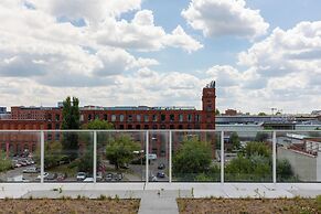 Studio Near Manufaktura Łódź by Renters