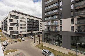 Studio Near Manufaktura Łódź by Renters