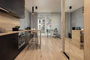 Studio Near Manufaktura Łódź by Renters