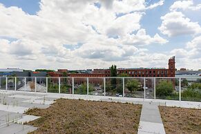 Studio Near Manufaktura Łódź by Renters