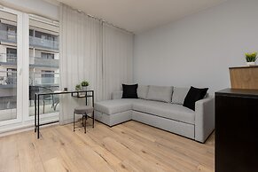 Studio Near Manufaktura Łódź by Renters