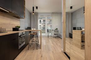 Studio Near Manufaktura Łódź by Renters