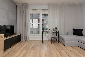 Studio Near Manufaktura Łódź by Renters