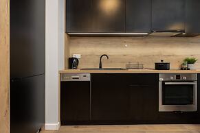 Studio Near Manufaktura Łódź by Renters