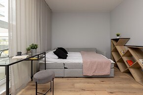Studio Near Manufaktura Łódź by Renters