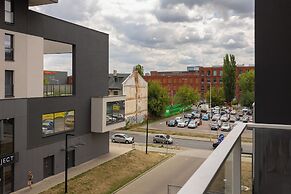 Studio Near Manufaktura Łódź by Renters