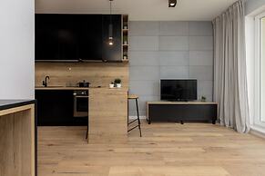 Studio Near Manufaktura Łódź by Renters