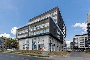 Studio Near Manufaktura Łódź by Renters