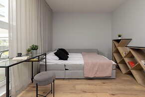 Studio Near Manufaktura Łódź by Renters