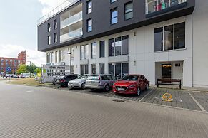 Studio Near Manufaktura Łódź by Renters