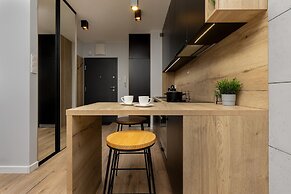 Studio Near Manufaktura Łódź by Renters