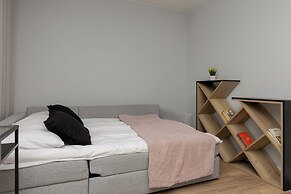 Studio Near Manufaktura Łódź by Renters