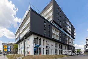 Studio Near Manufaktura Łódź by Renters