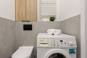 Studio Near Manufaktura Łódź by Renters