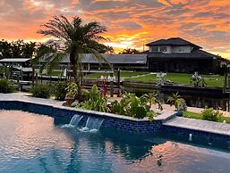 Awesome Location with Dock, Pool, Bicycles & Kayaks by RedAwning