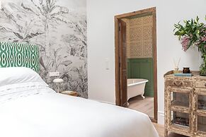 The Green House by Santiago de Alfama