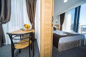 Rooftop Apartments & Rooms