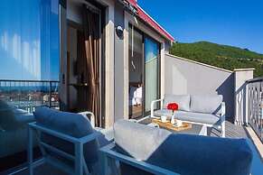 Rooftop Apartments & Rooms