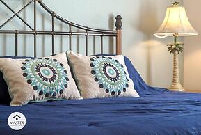 3 Bedrooms S / Lucaya Village Townhouse by RedAwning