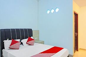 OYO 92585 Smiley 999