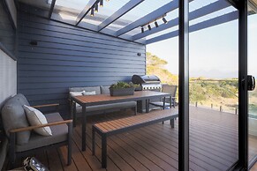 Coast Beachfront Retreat