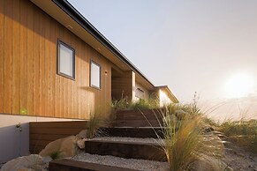 Coast Beachfront Retreat
