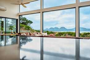 Coast Beachfront Retreat