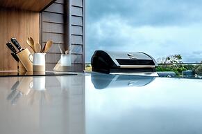 Coast Beachfront Retreat