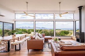 Coast Beachfront Retreat