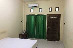 OYO 92608 Penginapan Mc Lodge