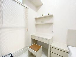 Minimalist And Homey Studio Room At Amartha View Apartment