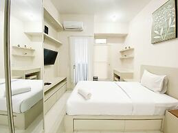Minimalist And Homey Studio Room At Amartha View Apartment