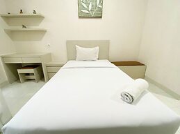 Minimalist And Homey Studio Room At Amartha View Apartment