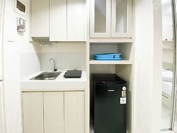 Minimalist And Homey Studio Room At Amartha View Apartment