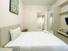 Minimalist And Homey Studio Room At Amartha View Apartment