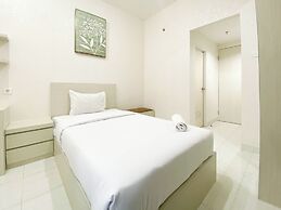 Minimalist And Homey Studio Room At Amartha View Apartment