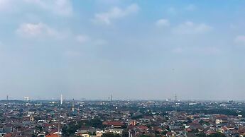 Restful 2Br Bassura City Apartment Near Shopping Mall