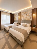 Lumiera Suites Hotel