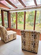 Whispering Pines Riverside Getaway