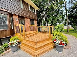 Whispering Pines Riverside Getaway
