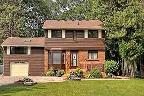 Whispering Pines Riverside Getaway