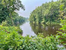 Whispering Pines Riverside Getaway